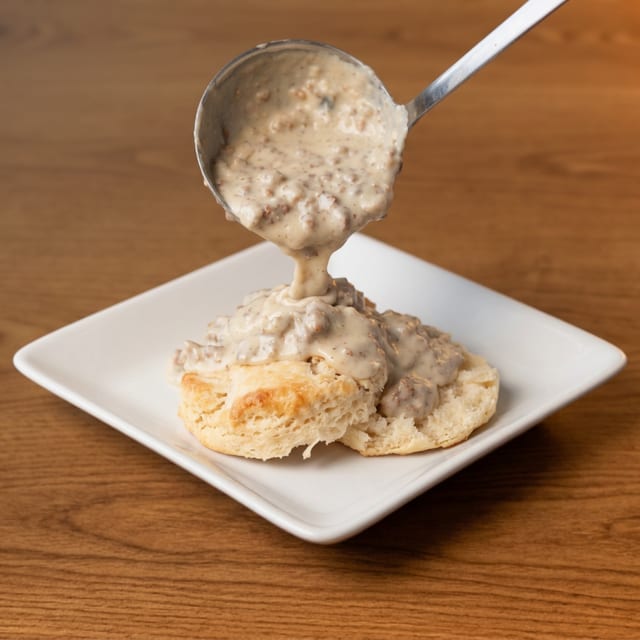 Sausage Gravy Over One Biscuit.